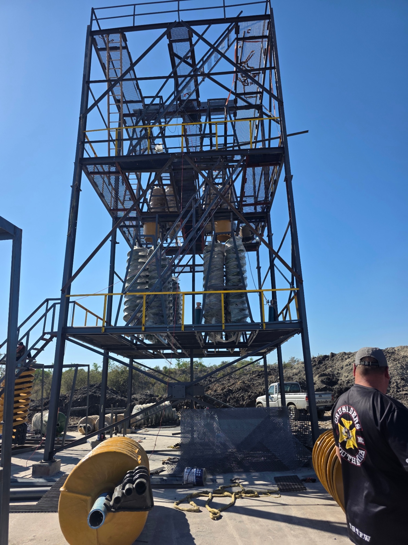 Spiral concentrator tower with banked spirals
